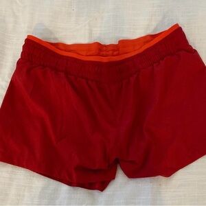 Red running shorts